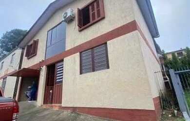 Imagem: A casa possui 2 Dormitórios, 1 Banheiro, 1 Vaga na garagem