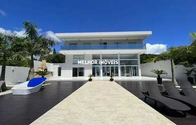 Imagem: A casa possui 5 Dormitórios, 5 Banheiros, 5 Vagas na garagem