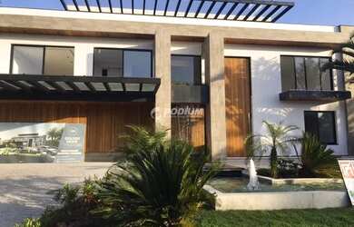 Imagem: A casa possui 5 Dormitórios, 5 Banheiros, 5 Vagas na garagem