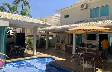 Imagem: A casa em condomínio possui 4 Dormitórios, 5 Banheiros, 5