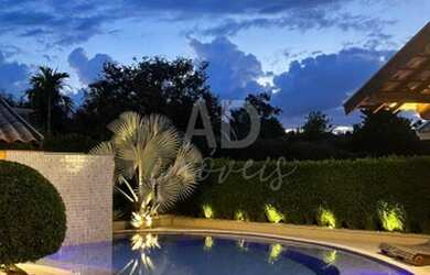 Imagem: A casa em condomínio possui 4 Dormitórios, 5 Banheiros, 4