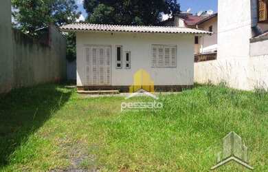 Imagem: A casa possui 2 Dormitórios, 1 Banheiro, 1 Vaga na garagem