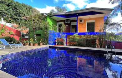 Imagem: A casa em condomínio possui 5 Dormitórios, 5 Banheiros, 4