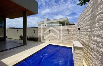 Imagem: A casa em condomínio possui 4 Dormitórios, 5 Banheiros, 4