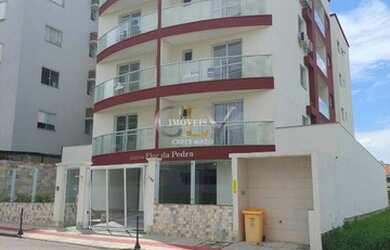 Imagem: O apartamento e possui 3 Dormitórios, Suítes, 2 Banheiros