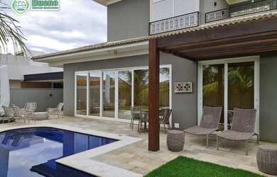 Imagem: A casa em condomínio possui 4 Dormitórios, 5 Banheiros, 5