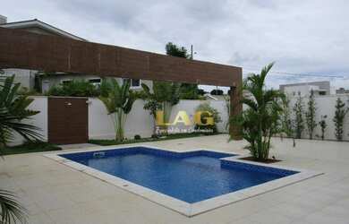 Imagem: A casa em condomínio possui 5 Dormitórios, 5 Banheiros, 5