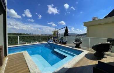 Imagem: A casa em condomínio possui 4 Dormitórios, 5 Banheiros, 5