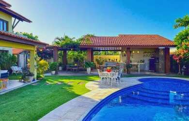 Imagem: A casa possui 5 Dormitórios, 5 Banheiros, 5 Vagas na garagem