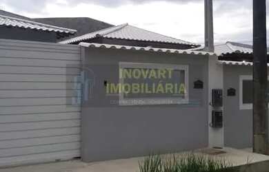 Imagem: A casa possui 3 Dormitórios, 1 Banheiro, 1 Vaga na garagem