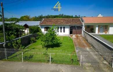 Imagem: A casa possui 3 Dormitórios, 1 Banheiro, 1 Vaga na garagem