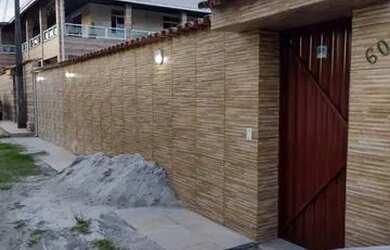 Imagem: A casa possui 5 Dormitórios, 3 Vagas na garagem e está localizado