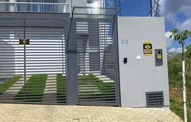 Imagem: A casa possui 3 Dormitórios, 4 Banheiros, 3 Vagas na garagem