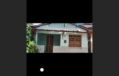 Imagem: A casa possui 3 Dormitórios, 1 Banheiro e está localizado