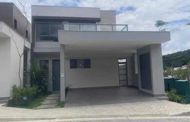 Imagem: A casa em condomínio possui 2 Dormitórios, 3 Banheiros, 2