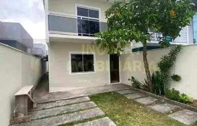 Imagem: A casa possui 3 Dormitórios, 2 Banheiros, 3 Vagas na garagem