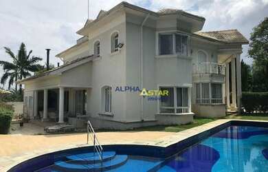 Imagem: A casa em condomínio possui 5 Dormitórios, 5 Banheiros, 5