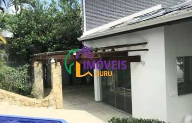 Imagem: A casa em condomínio possui 4 Dormitórios, 4 Banheiros, 4