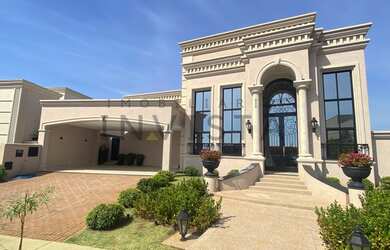 Imagem: A casa em condomínio possui 4 Dormitórios, 5 Banheiros, 4