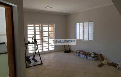 Imagem: A casa possui 3 Dormitórios, 4 Banheiros, 4 Vagas na garagem