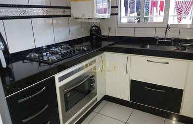 Imagem: A casa possui 3 Dormitórios, 2 Banheiros, 2 Vagas na garagem