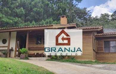 Imagem: A casa possui 3 Dormitórios, 1 Banheiro, 5 Vagas na garagem