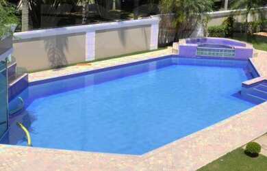 Imagem: A casa possui 5 Dormitórios, 5 Banheiros, 5 Vagas na garagem