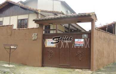 Imagem: A casa possui 2 Dormitórios, 2 Banheiros, 2 Vagas na garagem