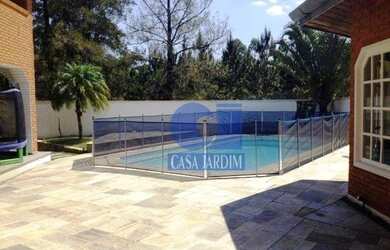 Imagem: A casa em condomínio possui 4 Dormitórios, 4 Banheiros, 4