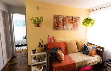 Imagem: O apartamento possui 2 Dormitórios, 1 Banheiro, 1 Vaga na garagem