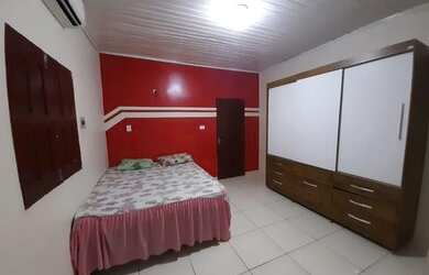 Imagem: A casa possui 3 Dormitórios, 2 Banheiros, 3 Vagas na garagem