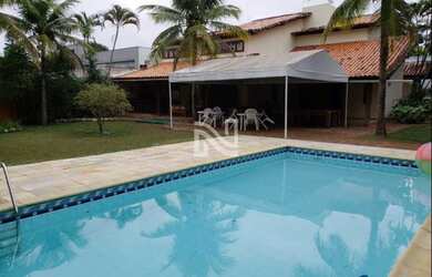 Imagem: A casa em condomínio possui 5 Dormitórios, 4 Banheiros, 5