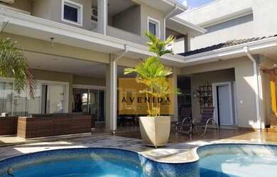 Imagem: A casa em condomínio possui 3 Dormitórios, 4 Banheiros, 5