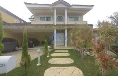 Imagem: A casa em condomínio possui 4 Dormitórios, 5 Banheiros, 4