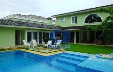 Imagem: A casa em condomínio possui 4 Dormitórios, 4 Banheiros, 2