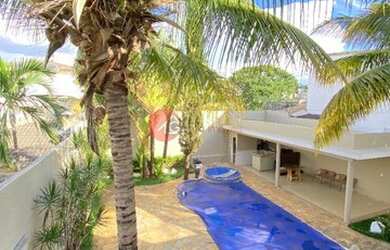 Imagem: A casa possui 4 Dormitórios, 5 Banheiros, 353m² de Área e