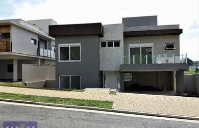 Imagem: A casa em condomínio possui 3 Dormitórios, 4 Banheiros, 4