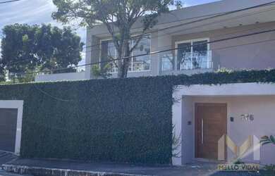 Imagem: A casa possui 4 Dormitórios, 4 Banheiros, 5 Vagas na garagem