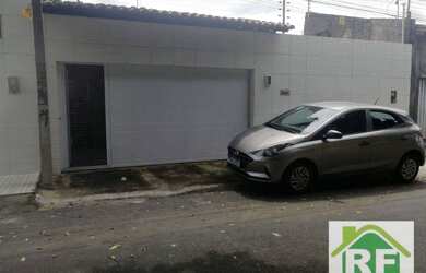 Imagem: A casa possui 3 Dormitórios, 3 Banheiros, 2 Vagas na garagem