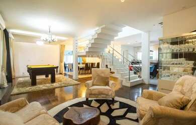 Imagem: A casa em condomínio possui 4 Dormitórios, 3 Banheiros, 4