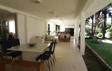 Imagem: A casa possui 3 Dormitórios, 5 Banheiros, 5 Vagas na garagem