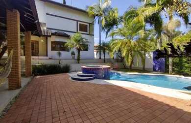 Imagem: A casa em condomínio para alugar possui 5 Dormitórios, 5 Banheiros