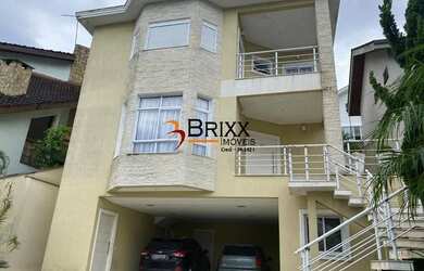 Imagem: A casa em condomínio possui 4 Dormitórios, 5 Banheiros, 4