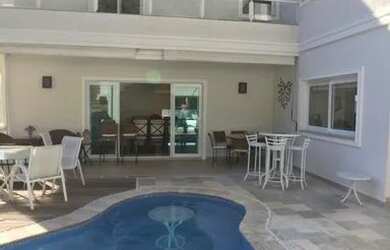 Imagem: A casa em condomínio possui 5 Dormitórios, 5 Banheiros, 5