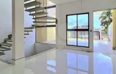 Imagem: A casa possui 3 Dormitórios, 5 Banheiros, 4 Vagas na garagem