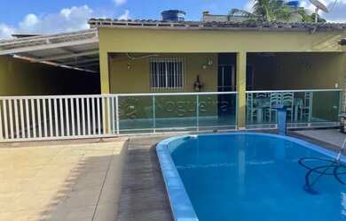 Imagem: A casa possui 3 Dormitórios, 1 Banheiro, 4 Vagas na garagem