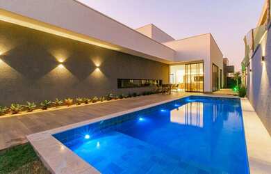 Imagem: A casa em condomínio possui 4 Dormitórios, 5 Banheiros, 4