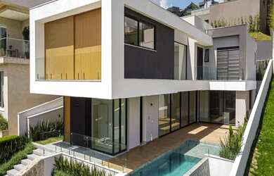 Imagem: A casa em condomínio possui 4 Dormitórios, 5 Banheiros, 5