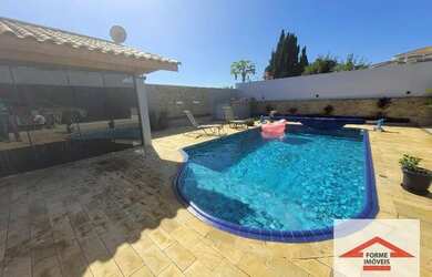 Imagem 1: Casa com 4 suítes, 581 m² - venda por R$ 4.500.000 ou aluguel por R$...