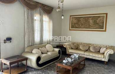 Imagem: A casa possui 5 Dormitórios, 5 Banheiros, 4 Vagas na garagem